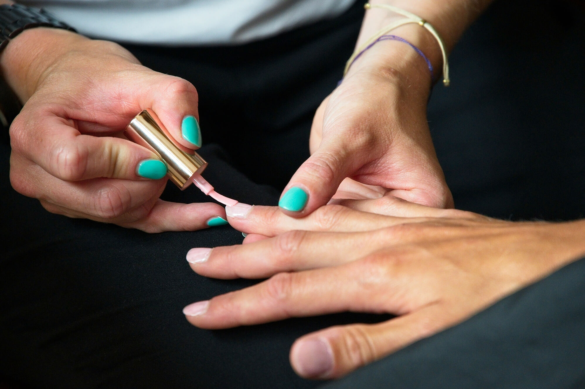 Person getting a builder gel manicure